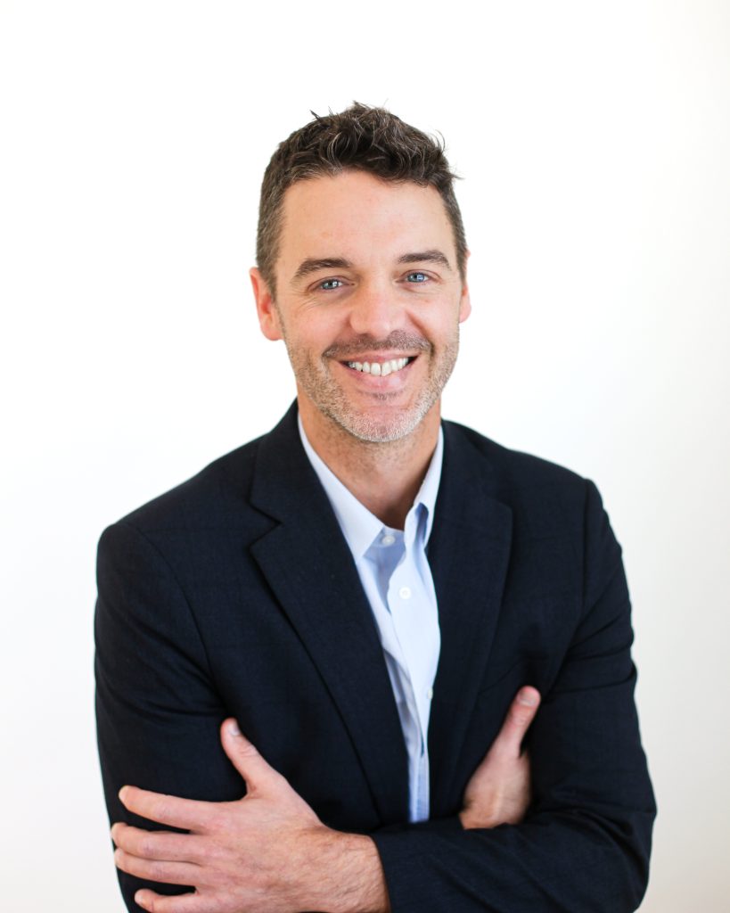 Portrait of man with arms crossed