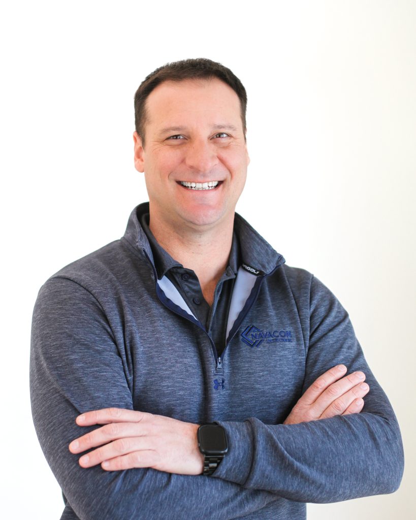 Portrait of man with arms crossed