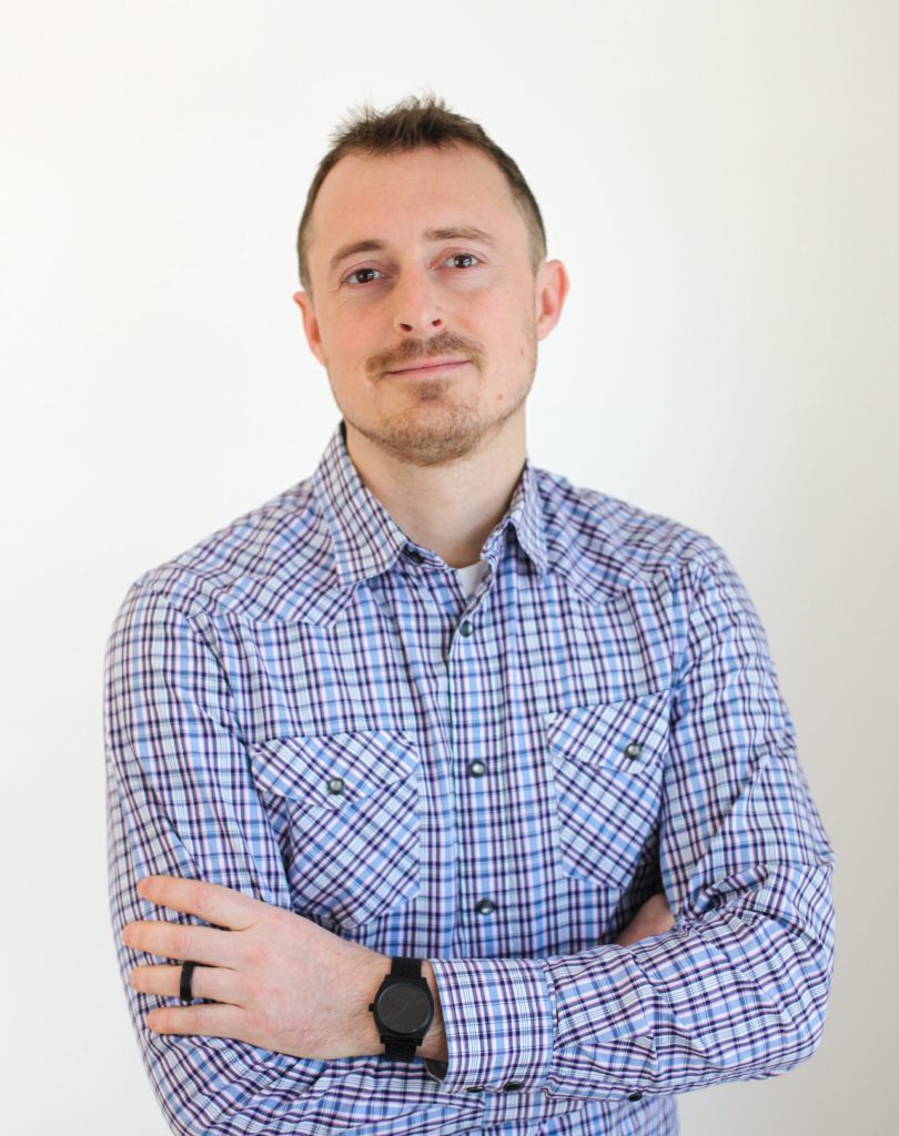 Portrait of man with arms crossed